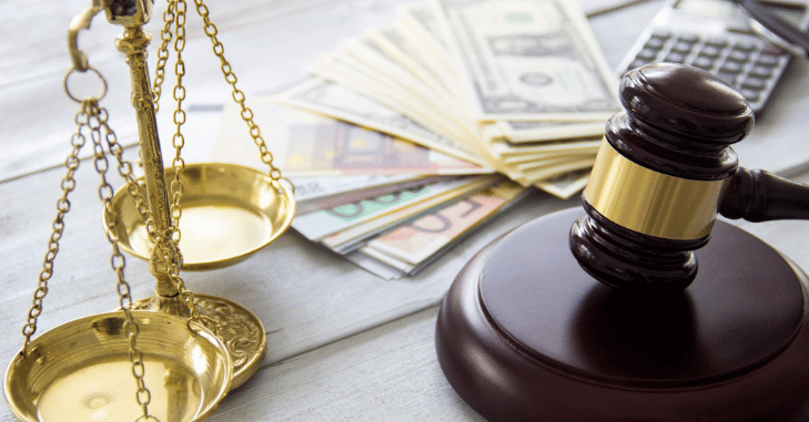 Legal professional reviewing pay and benefits
