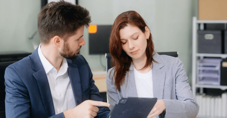 Corporate solicitor reviewing a transaction file